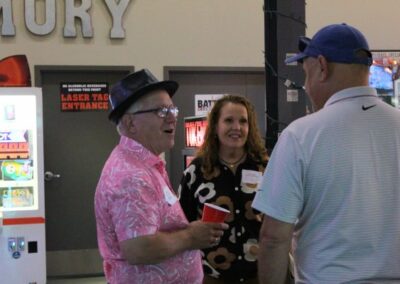 2 men and 1 woman chatting in bgr