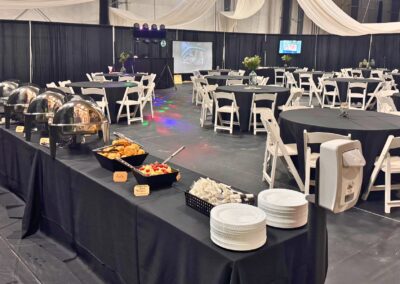 Full buffet setup with chaffing dishes and tables