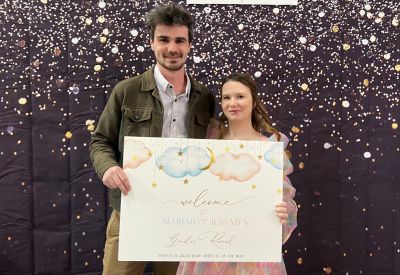 BGR Event Center Gender Reveal parents to be holding sign