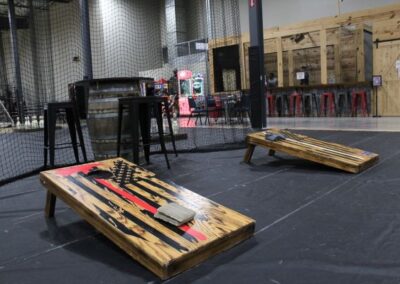 Cornhole boards in play area at BGR