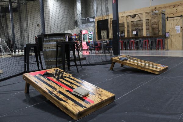 Cornhole boards in play area at BGR