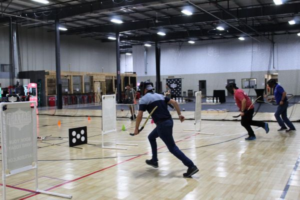 corporate archery tag games with 3 men