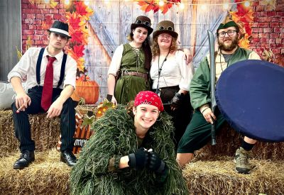 themed school event venue image of kids dressed for halloween