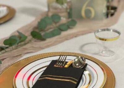 Grand Rapids Event Venue Table setting image, plate, napkin, and table number 6