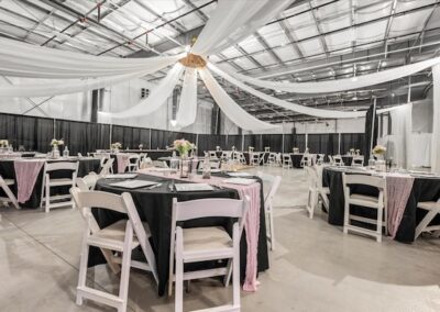 BGR Event Center Wedding setup for reception with white tables and chairs