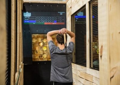 Axe throwing lane with male throwing at BGR Event Center